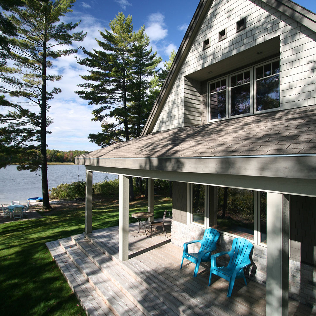 architect designed lakefront home - muskoka - lakeside covered porch